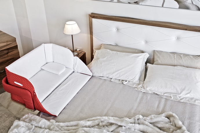The Culla Belly Co-Sleeper Attaches onto Beds For Easy Access