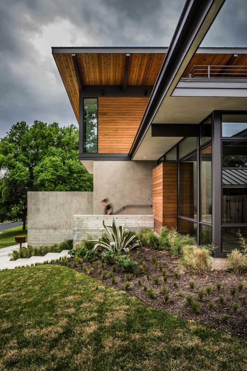 modern house with a concrete and wood facade