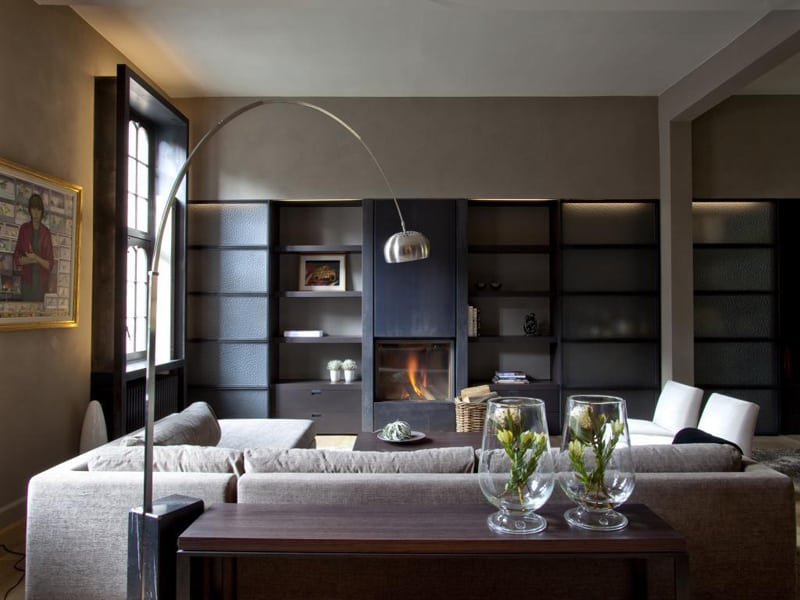 living room with arco floor lamp