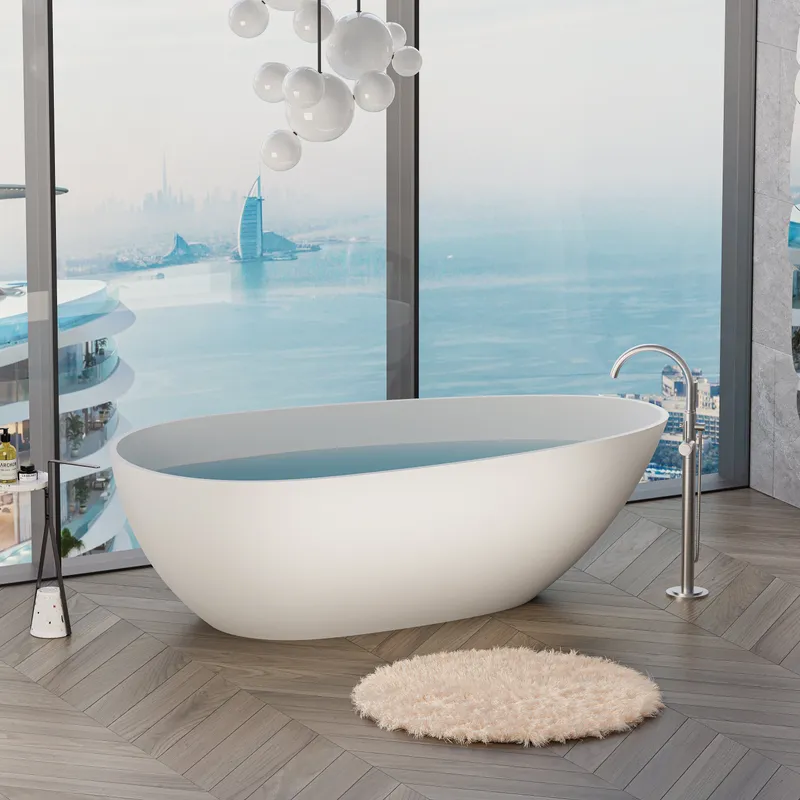 A contemporary bathroom design features a sleek white freestanding bathtub, herringbone wood flooring, and a plush rug, all overlooking a stunning cityscape through expansive windows.