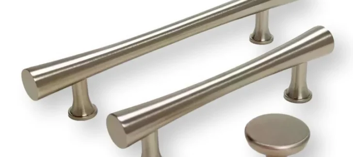 A curated selection of sleek brushed nickel kitchen cabinet pulls and a coordinating knob, showcasing modern hardware design and essential home design accents.