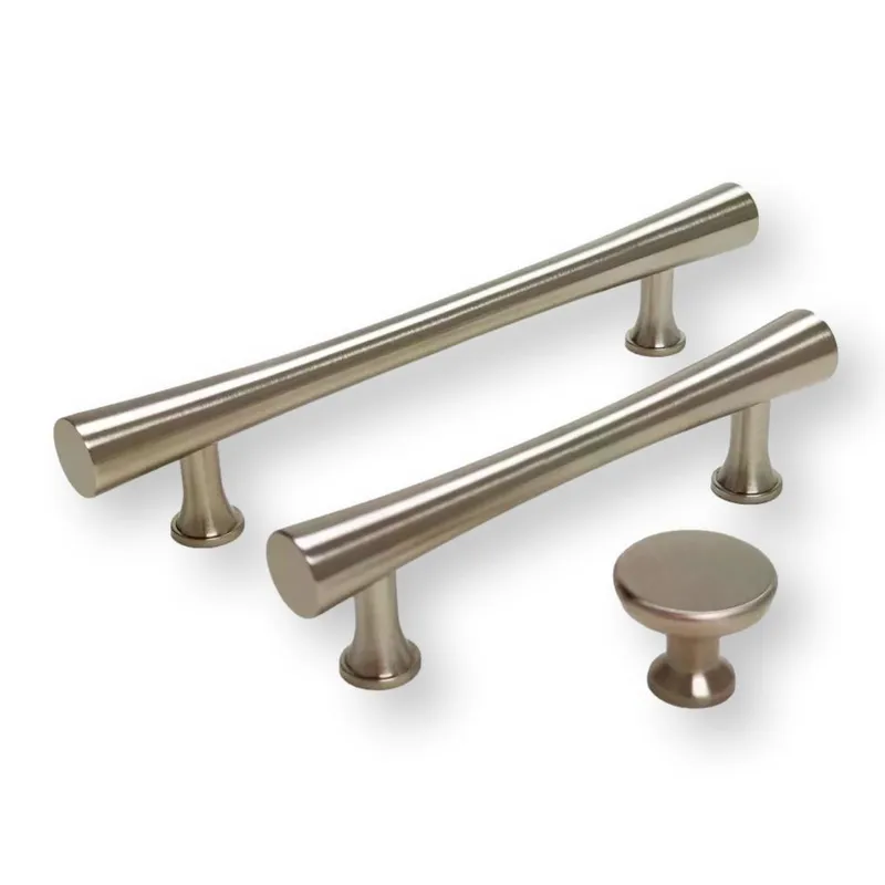 A curated selection of sleek brushed nickel kitchen cabinet pulls and a coordinating knob, showcasing modern hardware design and essential home design accents.