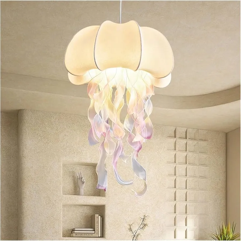 A whimsical jellyfish chandelier with flowing, translucent tentacles illuminates a modern interior space, featuring textured plaster walls, built-in shelving, and a decorative accent wall.